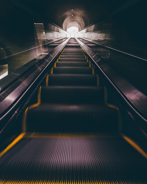 Escalator as metaphor for fear of making a career change